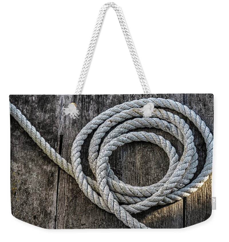 Rope Weekender Tote Bag featuring the photograph Curled Rope by Nadine Swart