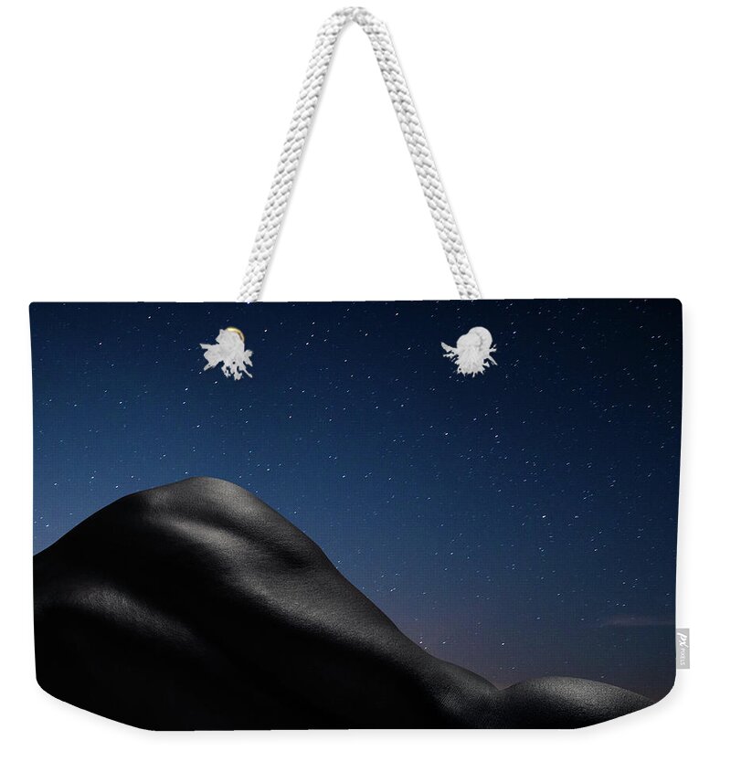 Skin Weekender Tote Bag featuring the photograph Dark Skinned Males Back Against Starry by Jonathan Knowles