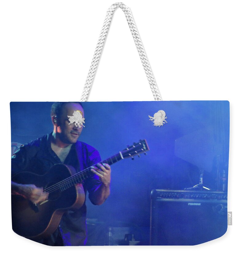 Dave Weekender Tote Bag featuring the photograph Dave's little Smile by Aaron Martens