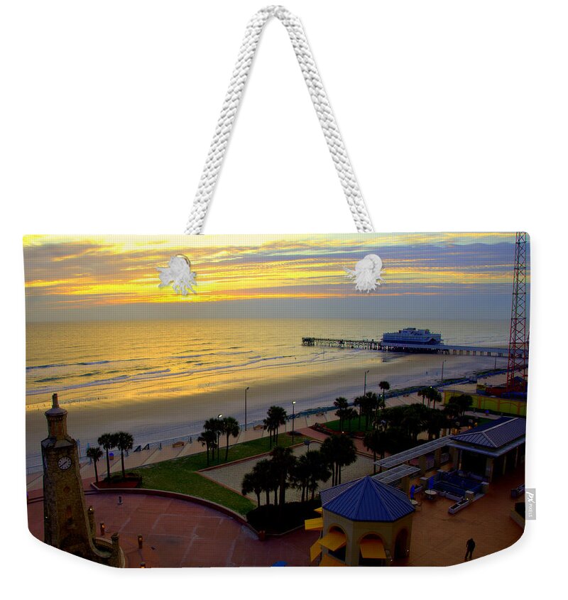 Daytona Beach Weekender Tote Bag featuring the photograph Daytona's Dawn by Karen Wiles