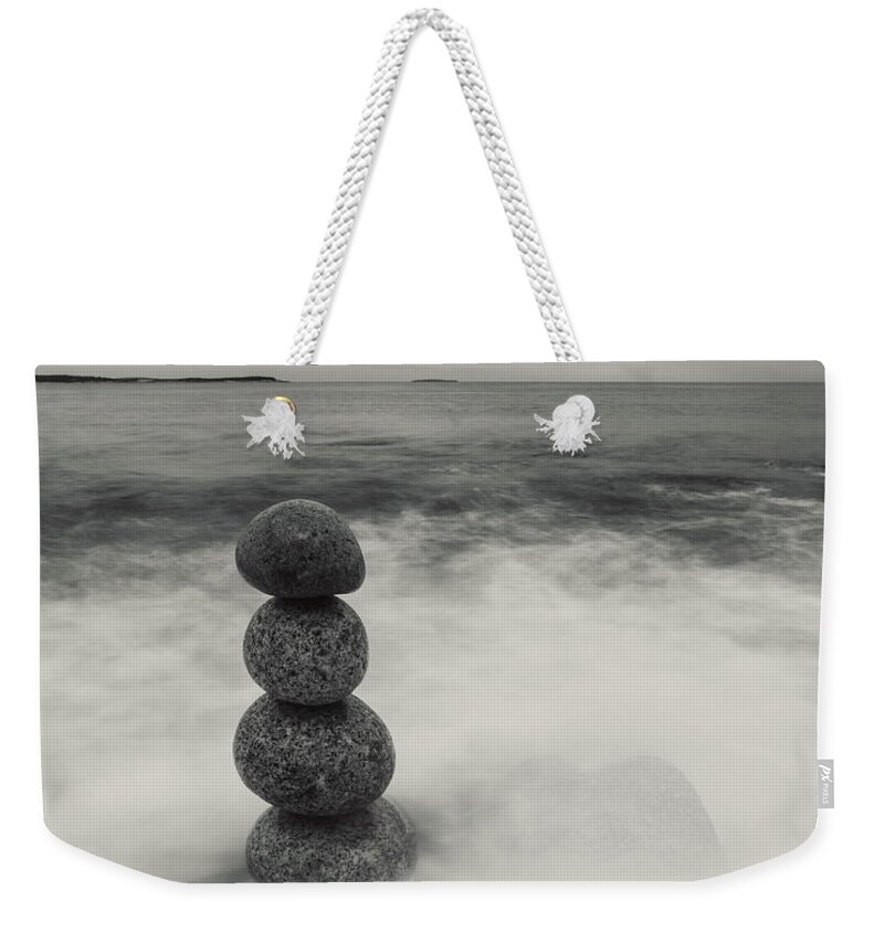 Curve Weekender Tote Bag featuring the photograph Defiant Balance by Shaunl