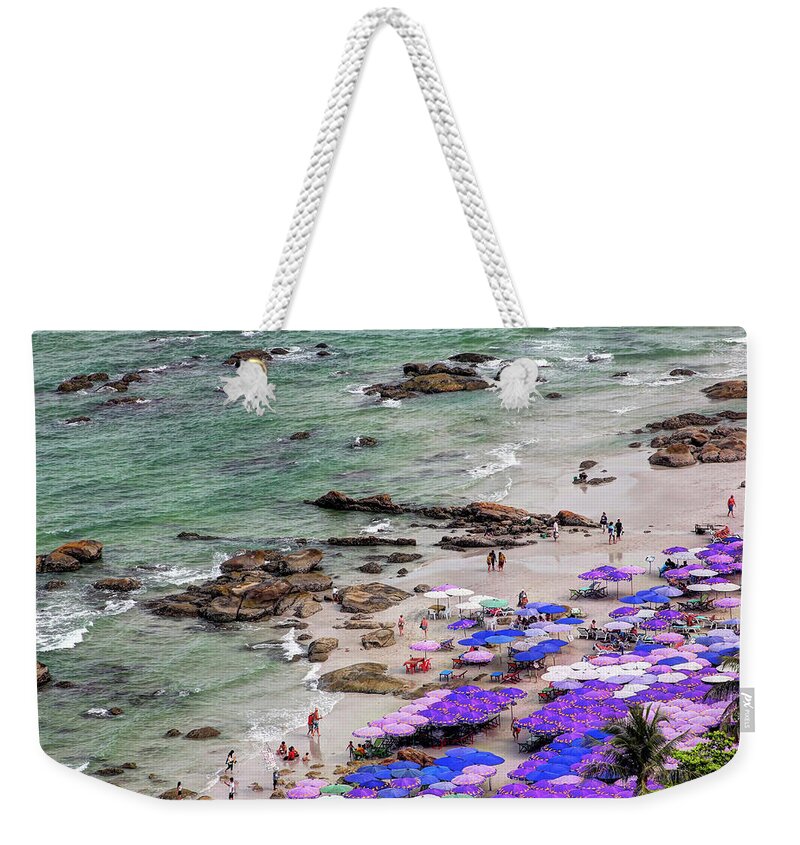 Water's Edge Weekender Tote Bag featuring the photograph Densely Packed Umbrellas Hua Hin Beach by Igor Prahin