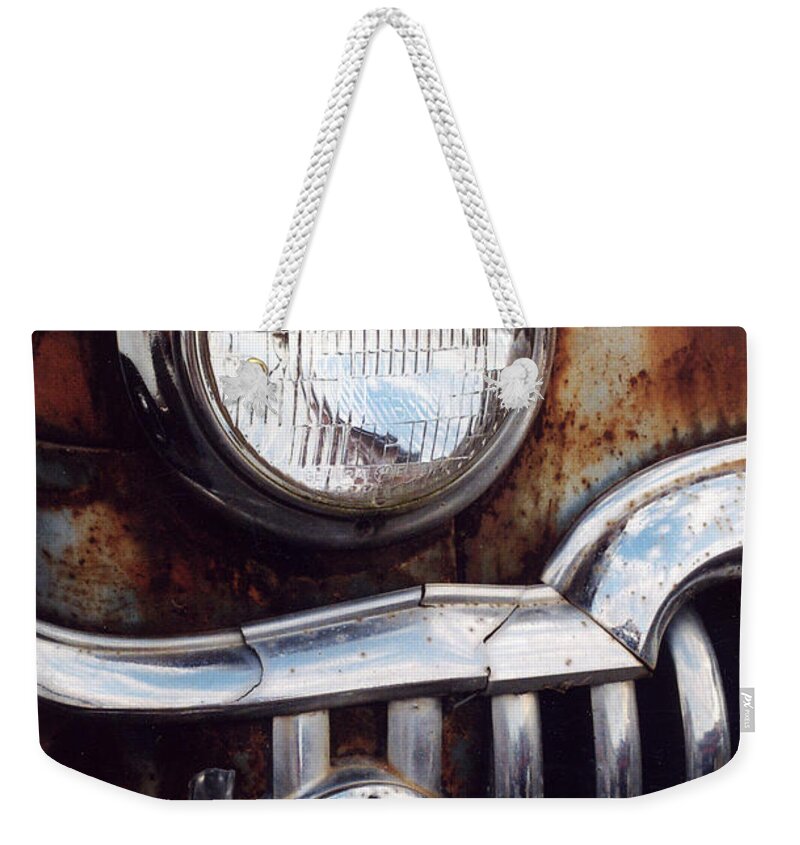 Car Weekender Tote Bag featuring the photograph DeSoto Headlight by Crystal Nederman
