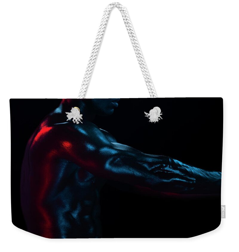 Human Arm Weekender Tote Bag featuring the photograph Detail Of A Muscular Male, Arm Muscles by Jonathan Knowles