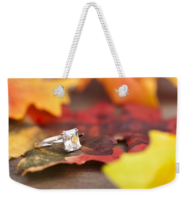 Red Weekender Tote Bag featuring the photograph Diamond Engagement ring by U Schade