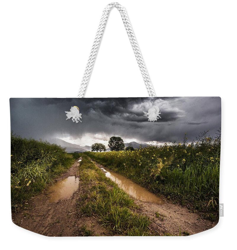 Rain Weekender Tote Bag featuring the photograph Distant Thunder by Movie Poster Prints