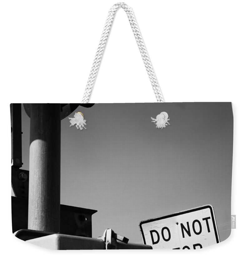 Funny Weekender Tote Bag featuring the photograph Do Not Stop Dancing on Tracks by Jason Politte