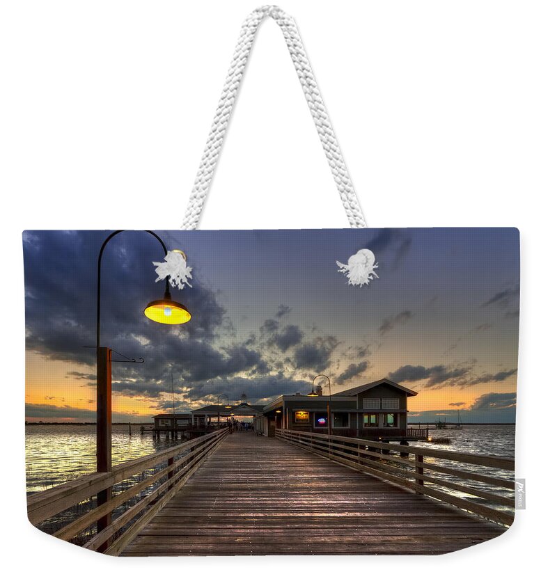 Boats Weekender Tote Bag featuring the photograph Dock lights at Jekyll Island by Debra and Dave Vanderlaan