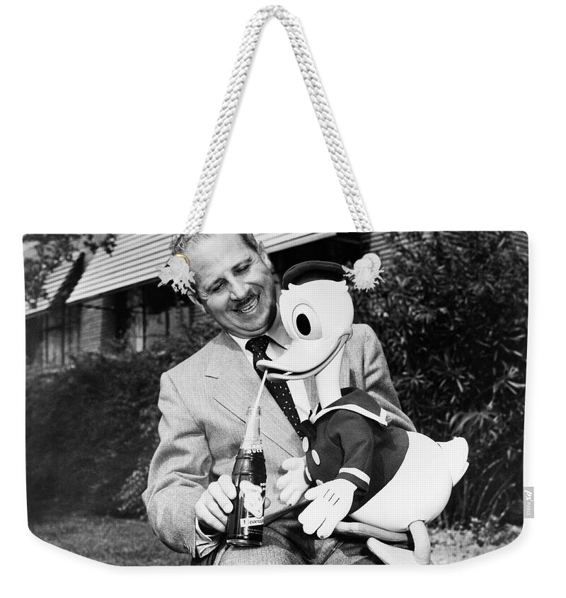 1940s Weekender Tote Bag featuring the photograph Donald Duck Lime Cola by Underwood Archives