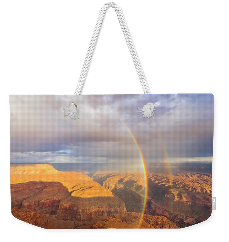 00345498 Weekender Tote Bag featuring the photograph Rainbow at Kanab Pt, Grand Canyon by Yva Momatiuk John Eastcott