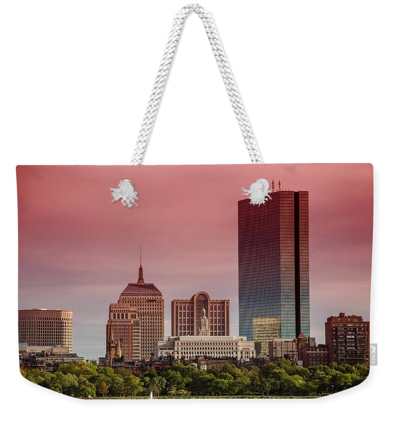 Boston Weekender Tote Bag featuring the photograph Downtown Boston at sunset as seen from Charles river by Eti Reid