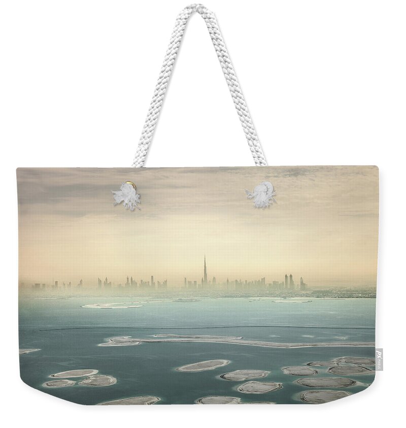 Arabia Weekender Tote Bag featuring the photograph Dubai Downtown Skyscrapers And Office by Leopatrizi