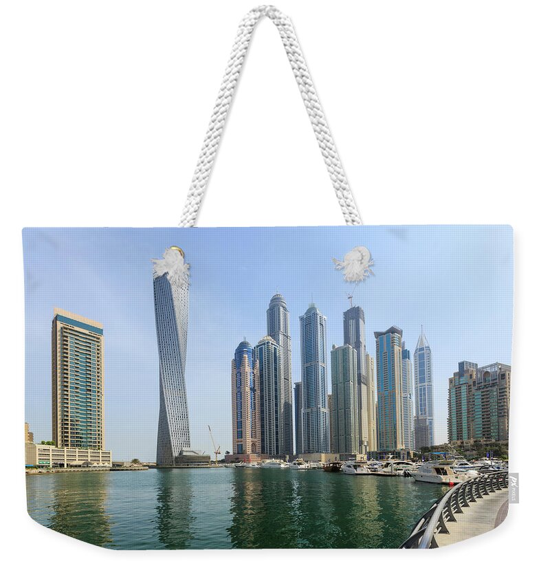 Tranquility Weekender Tote Bag featuring the photograph Dubai Marina by Fraser Hall