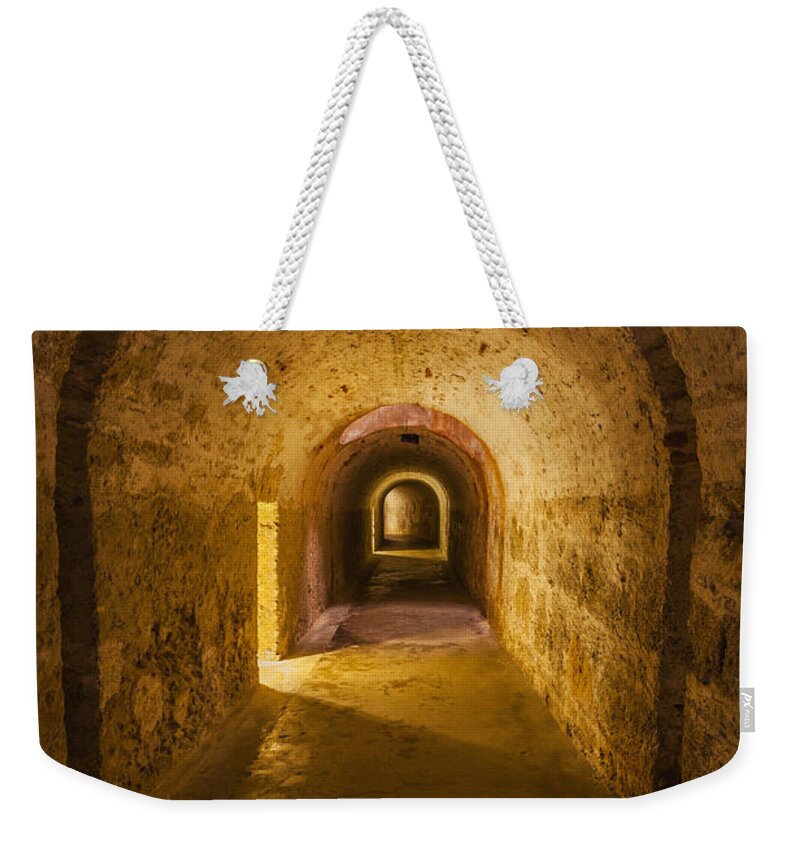 Bad Condition Weekender Tote Bag featuring the photograph Dungeon at Castillo San Cristobal in Old San Juan Puerto Rico by Bryan Mullennix