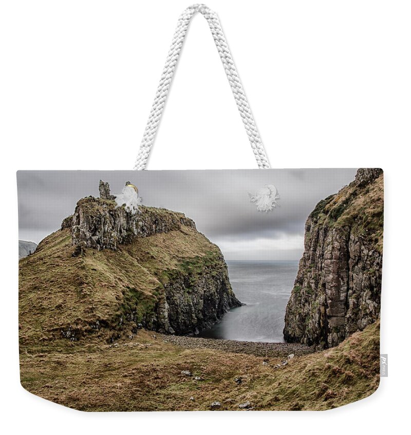Dunseverick Weekender Tote Bag featuring the photograph Dunseverick Castle by Nigel R Bell
