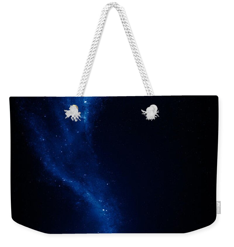 Earth Weekender Tote Bag featuring the photograph Earth and moon interconnected by Johan Swanepoel
