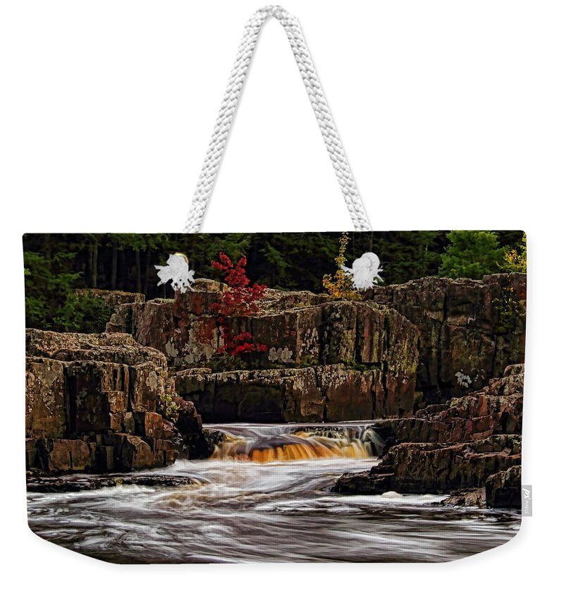 Autumn Weekender Tote Bag featuring the photograph Waterfall Under Colored Leaves by Dale Kauzlaric