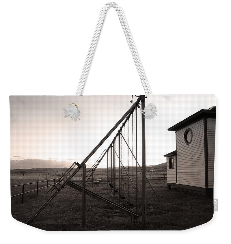 Playground Weekender Tote Bag featuring the photograph Echoes of Laughter by Jim Garrison
