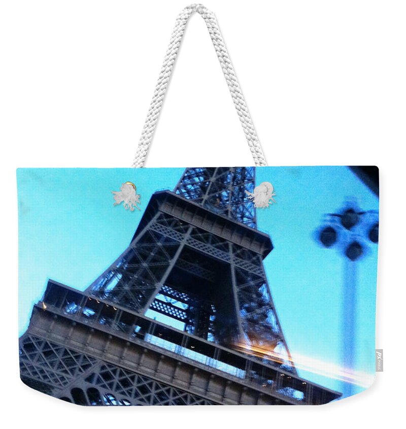 Paris Weekender Tote Bag featuring the photograph Eiffel in Motion by Kathy Corday