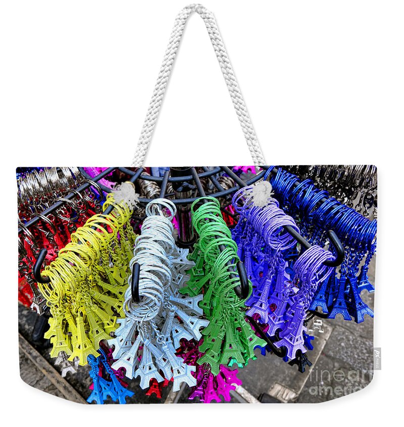 Eiffel Weekender Tote Bag featuring the photograph Eiffel Tower Trinkets by Olivier Le Queinec
