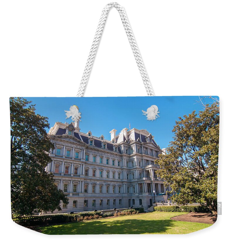 District Weekender Tote Bag featuring the photograph Eisenhower Executive Office Building in Washington DC by Alex Grichenko