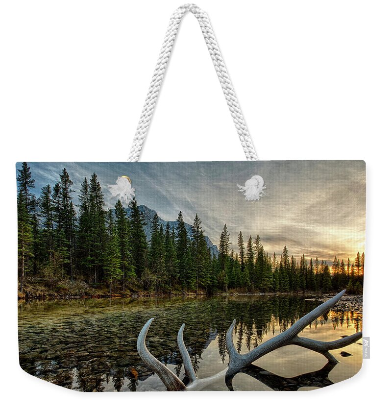 Scenics Weekender Tote Bag featuring the photograph Elk Antler Adds Reflection To Mountain by Ascent Xmedia