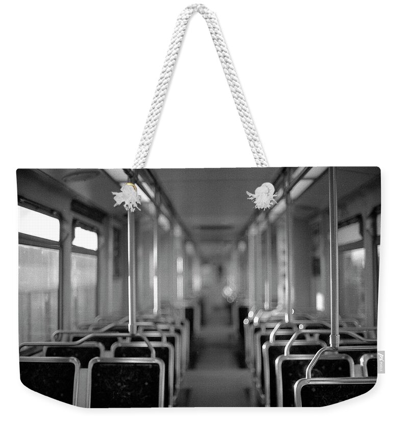 Tranquility Weekender Tote Bag featuring the photograph Empty Train by Phuong Nguyen