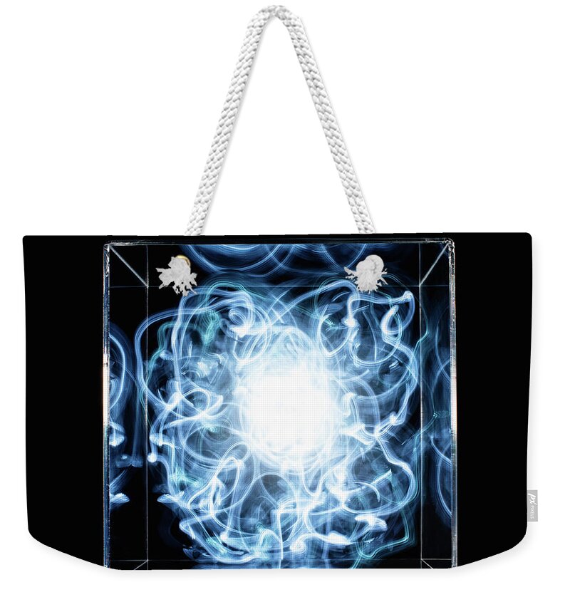 Confusion Weekender Tote Bag featuring the photograph Energy Trapped In Box by Pm Images