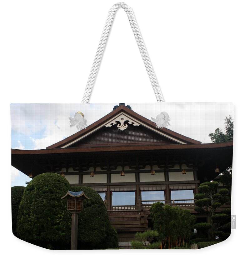 Epcot Weekender Tote Bag featuring the photograph Epcot Pavillion by David Nicholls