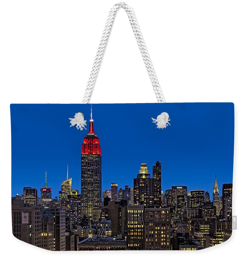 Flatiron District Weekender Tote Bag featuring the photograph ESB Surrounded By The Flatiron District by Susan Candelario