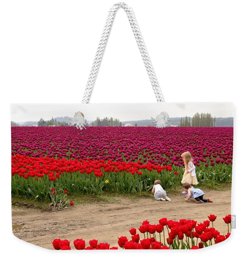 Tulips Weekender Tote Bag featuring the photograph Exploring the Tulip Fields by Jennifer Wheatley Wolf