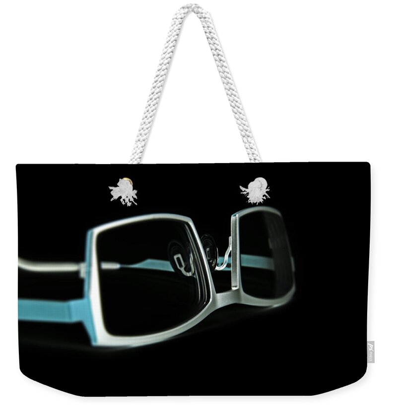 Design Weekender Tote Bag featuring the photograph Eyeglasses by Chevy Fleet