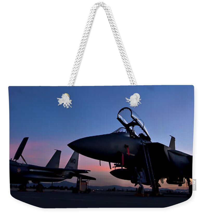 3scape Weekender Tote Bag featuring the photograph F-15E Strike Eagles at Dusk by Adam Romanowicz