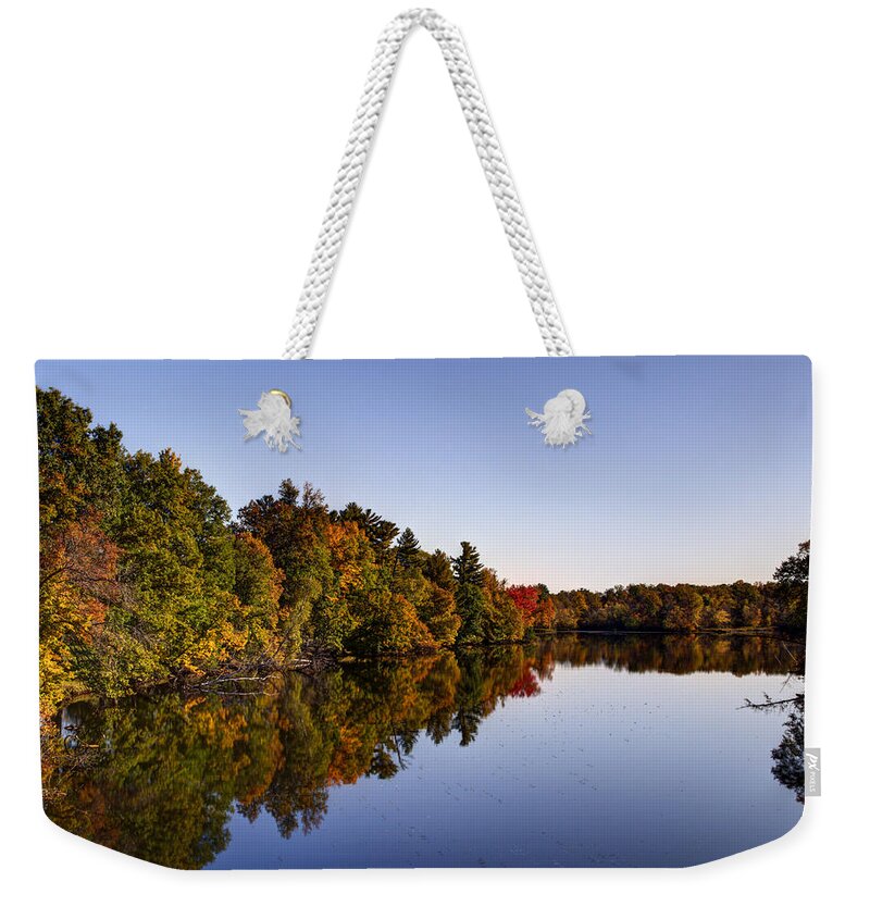Menominee River Weekender Tote Bag featuring the photograph Fall on the Menominee River by Thomas Young