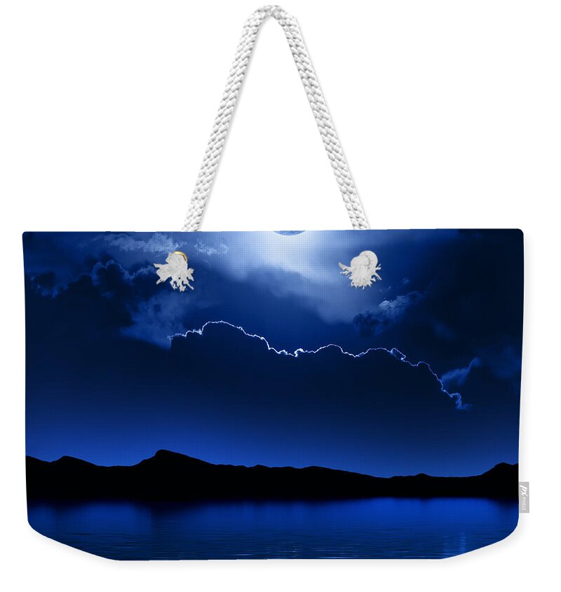 Moon Weekender Tote Bag featuring the photograph Fantasy Moon and Clouds over water by Johan Swanepoel