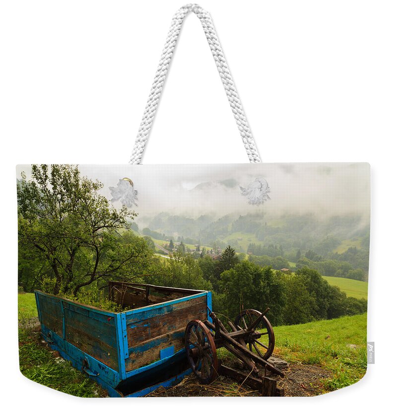 Bavarian Weekender Tote Bag featuring the photograph Farm Carriage by Raul Rodriguez
