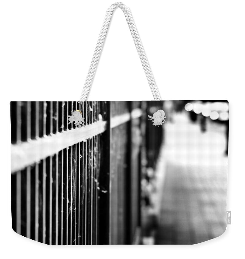 Fence Weekender Tote Bag featuring the photograph Fence At Eight by J C