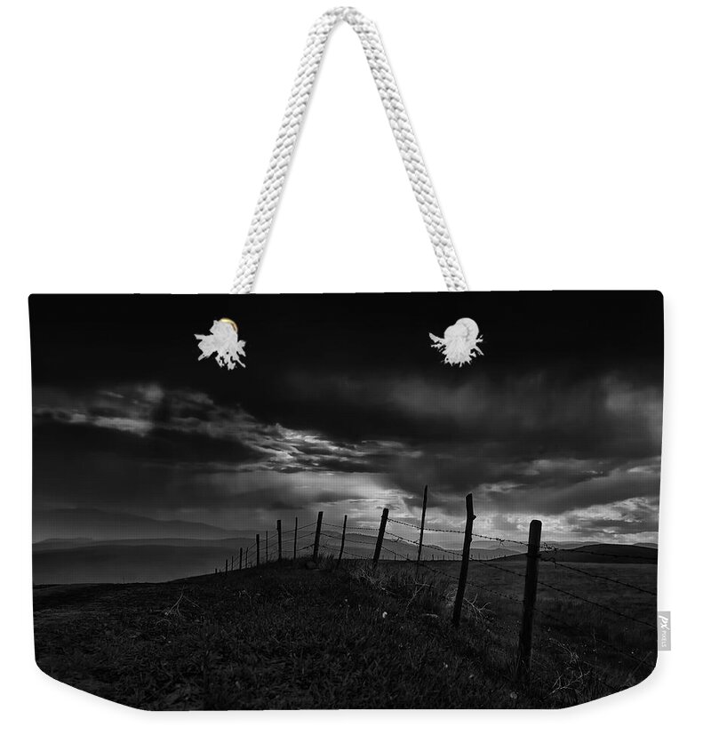 Black And White Weekender Tote Bag featuring the photograph Fence Line by Theresa Tahara