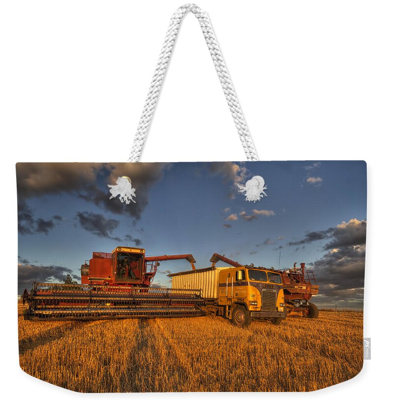 Mark Kiver Weekender Tote Bag featuring the photograph Filler Up by Mark Kiver