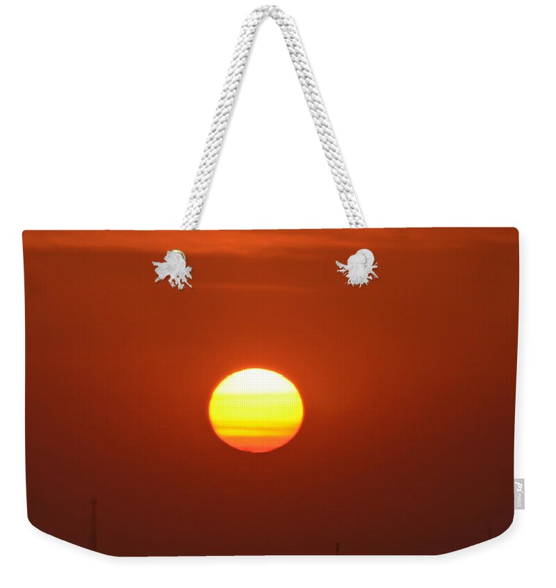 Sunrise Weekender Tote Bag featuring the photograph Fire In The Sky by Kerri Farley