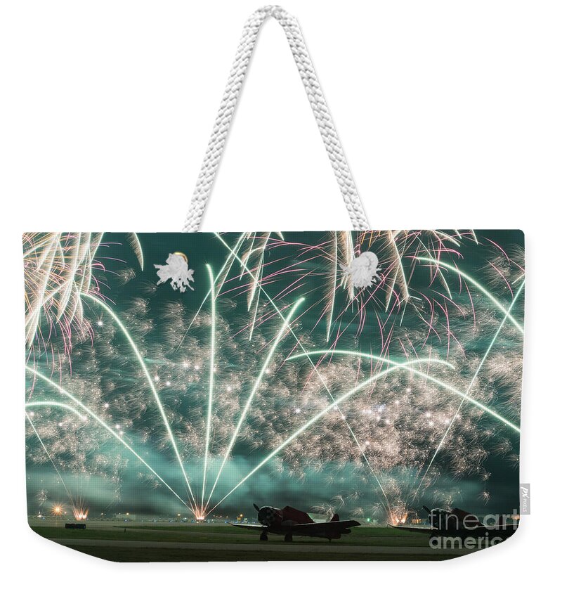 Fireworks Weekender Tote Bag featuring the photograph Fireworks and aircraft by Paul Quinn