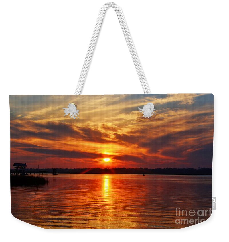 Sunset Weekender Tote Bag featuring the photograph Firey Sunset by Kathy Baccari