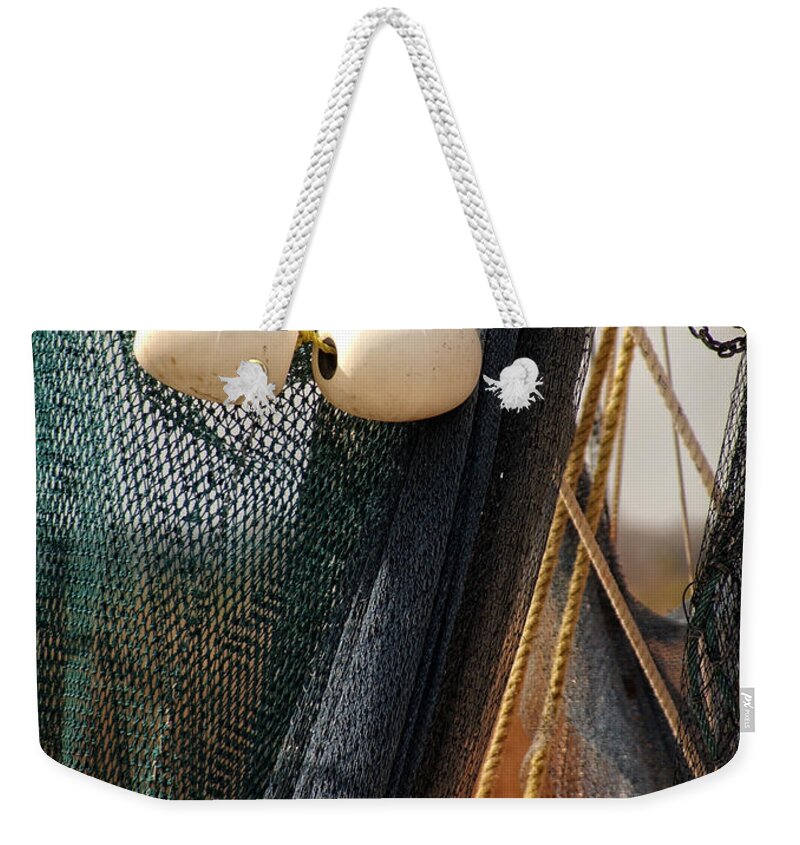 Fish Net Weekender Tote Bag featuring the photograph Fishing Net And Floats by Greg and Chrystal Mimbs