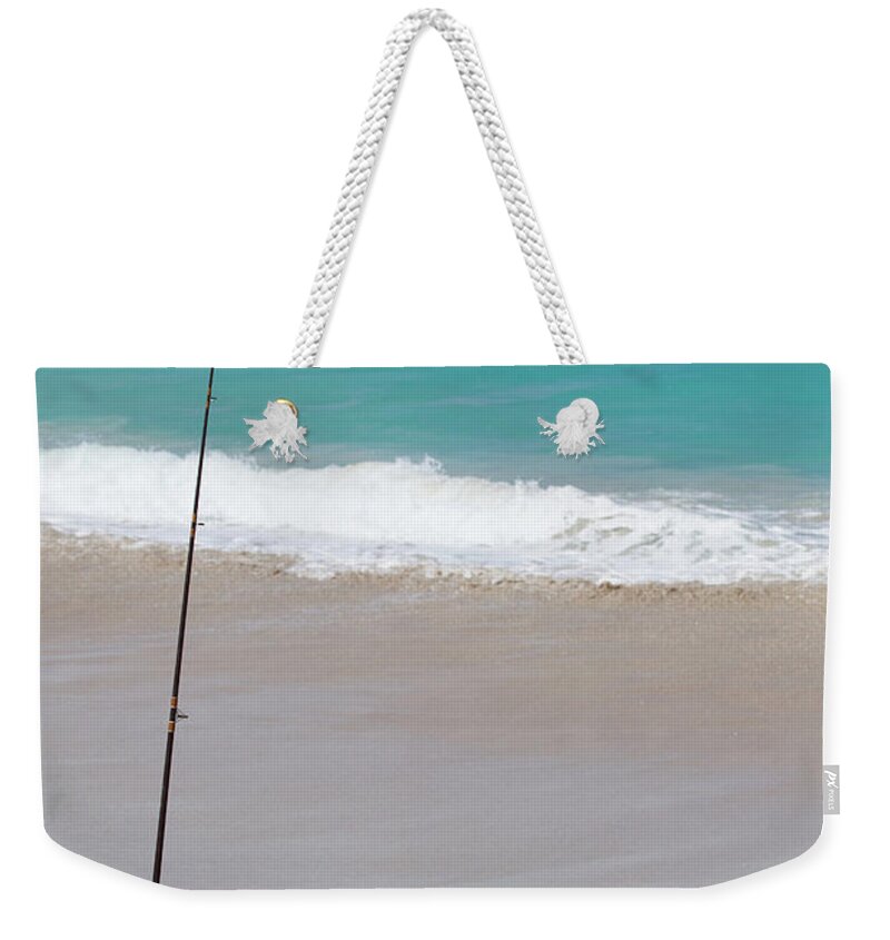 Scenics Weekender Tote Bag featuring the photograph Fishing Rod On Beach, Australia by Robert Lang Photography