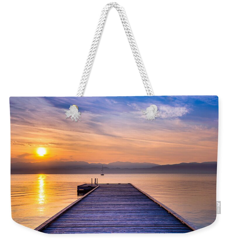 Flathead Lake Weekender Tote Bag featuring the photograph Flathead Lake Sunrise by Adam Mateo Fierro