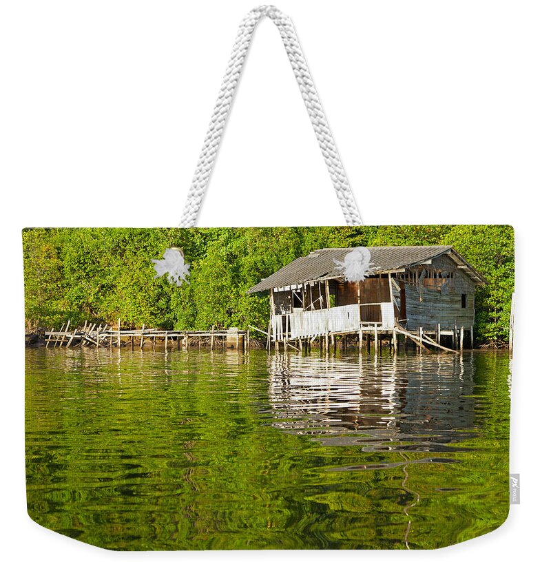 Reflection Weekender Tote Bag featuring the photograph Floating Hut by Alexey Stiop