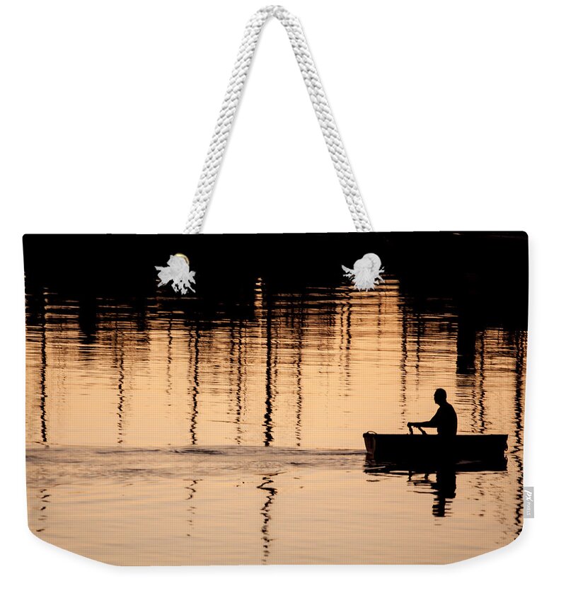 Rowboat At Sunset Weekender Tote Bag featuring the photograph Fluid thoughts by Denise Dube