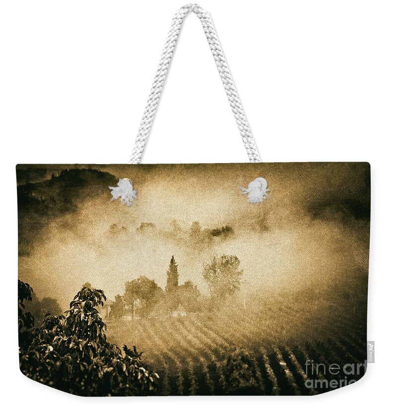 Atmospheric Weekender Tote Bag featuring the photograph Foggy Tuscany by Silvia Ganora