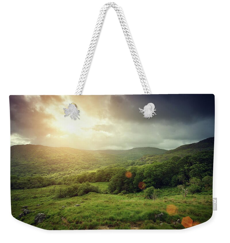 Scenics Weekender Tote Bag featuring the photograph Forest Covered Mountains At Sunrise by Mammuth