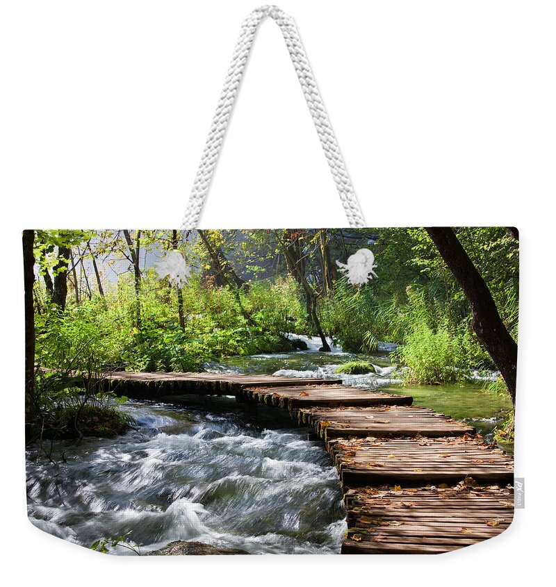 Water Weekender Tote Bag featuring the photograph Forest Stream Scenery by Artur Bogacki